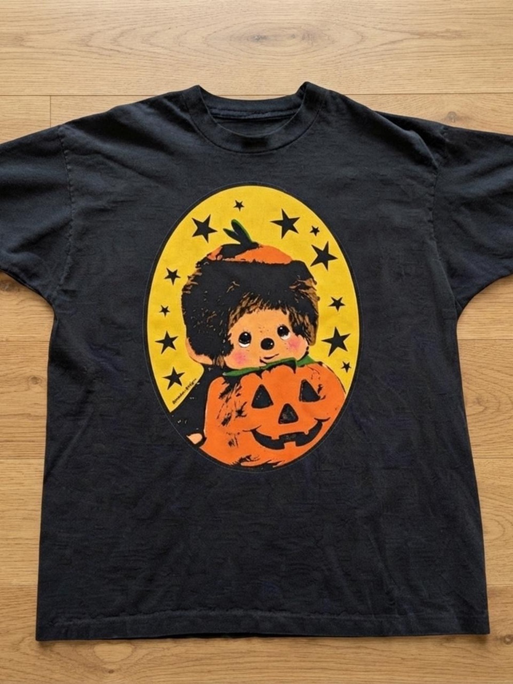 Gildan Black Tee with Orange Pumpkin Kid Graphic and Yellow Oval